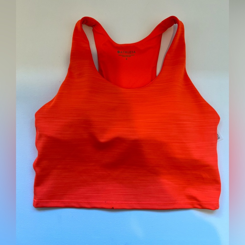 Orange Lululemon athletica workout top with built in bra